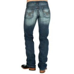 CinchWomens Ada Mid Rise Relaxed Med Wash Bootcut Jean